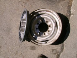 Ford Rims, 8 lugs, steel, With hubcaps – $400